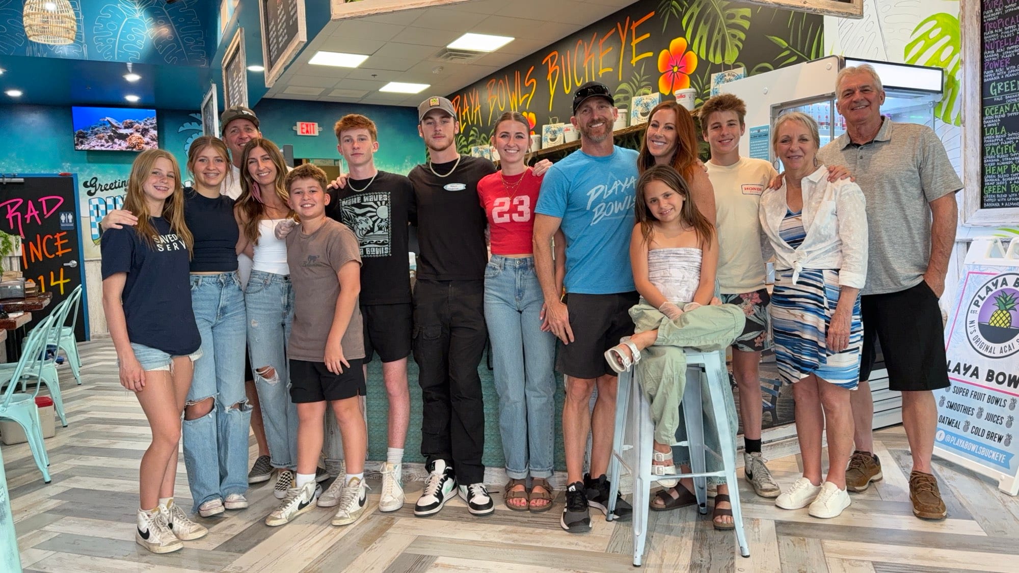 Our family and all the owners together in our first Playa Bowls store